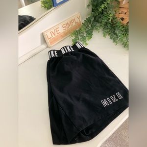 Black Nike shorts girls size large